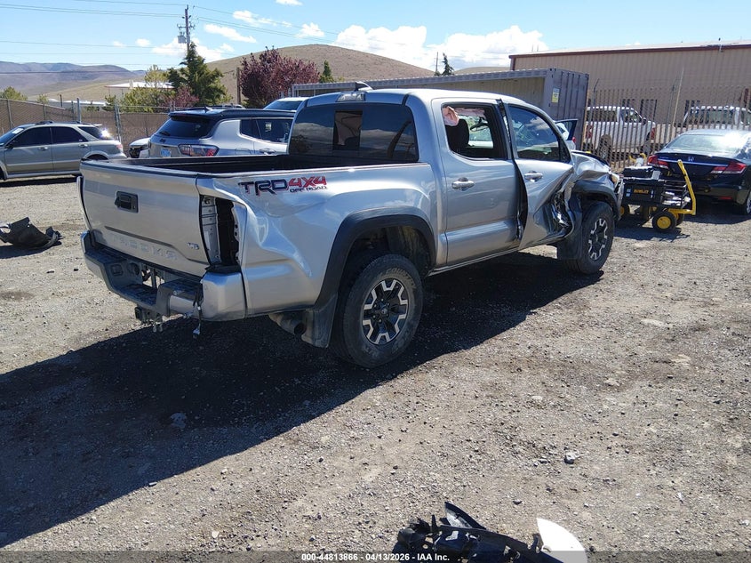 2021 Toyota Tacoma VIN 5TFCZ5AN6MX257428 IAAI salvage auction — ROLLOVER, Salvage (Nevada), sold $11,750 on 2026-07-10 (photo 4)
