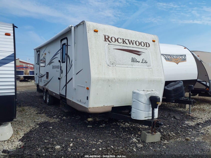 2011 Rockwood Other VIN 4X4TRLB20BD109373 IAAI salvage auction — STORM DAMAGE, Clear (Michigan), sold $25 on 2026-07-28 (photo 1)