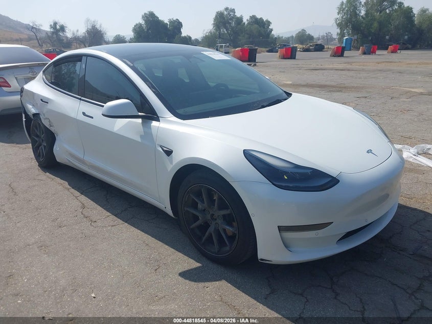 2022 Tesla Model 3 VIN 5YJ3E1EB5NF265634 IAAI salvage auction — RIGHT SIDE, Salvage Title, sold $7,100 on 2026-07-07 (photo 1)