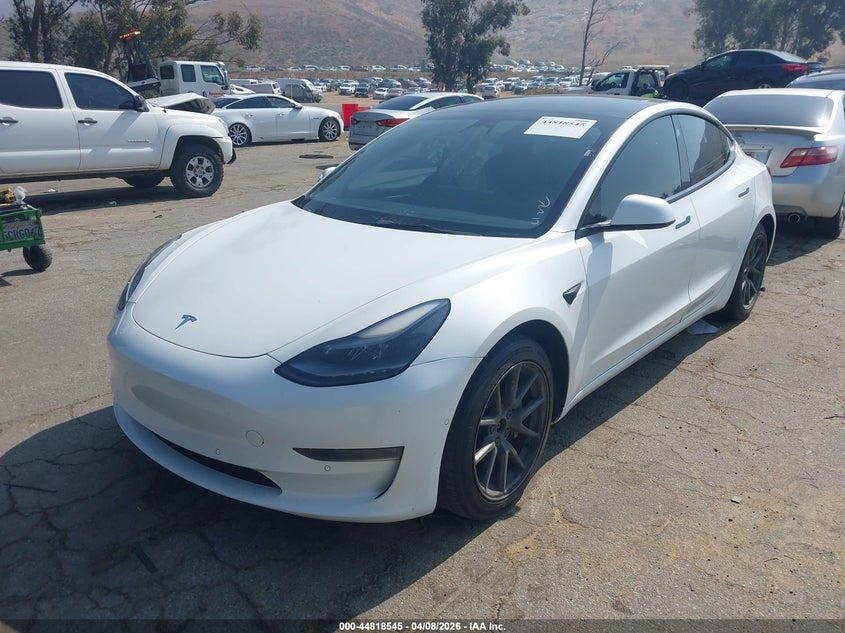 2022 Tesla Model 3 VIN 5YJ3E1EB5NF265634 IAAI salvage auction — RIGHT SIDE, Salvage Title, sold $7,100 on 2026-07-07 (photo 2)