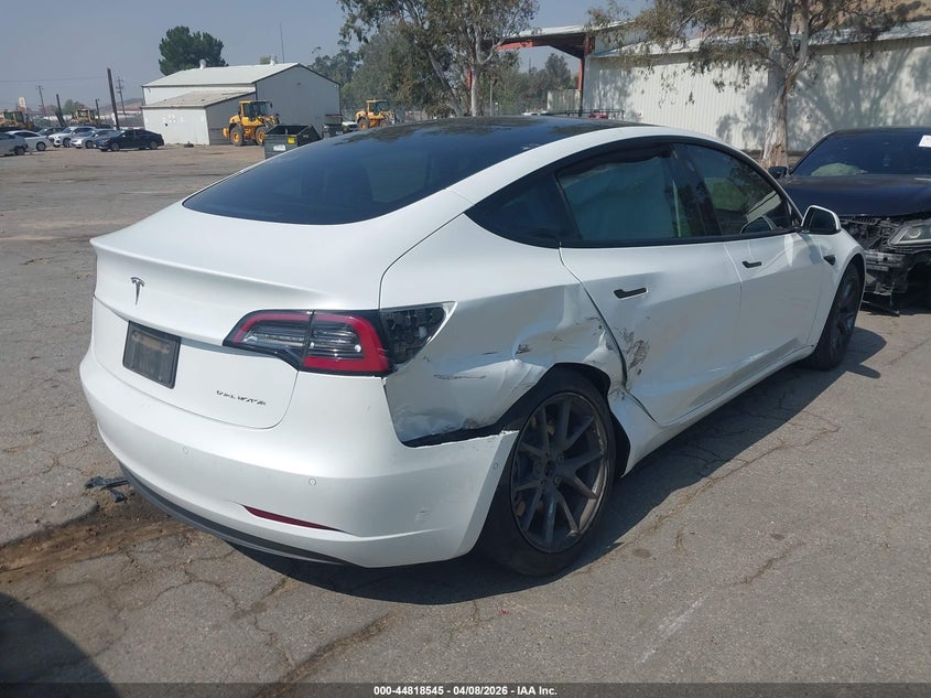 2022 Tesla Model 3 VIN 5YJ3E1EB5NF265634 IAAI salvage auction — RIGHT SIDE, Salvage Title, sold $7,100 on 2026-07-07 (photo 4)