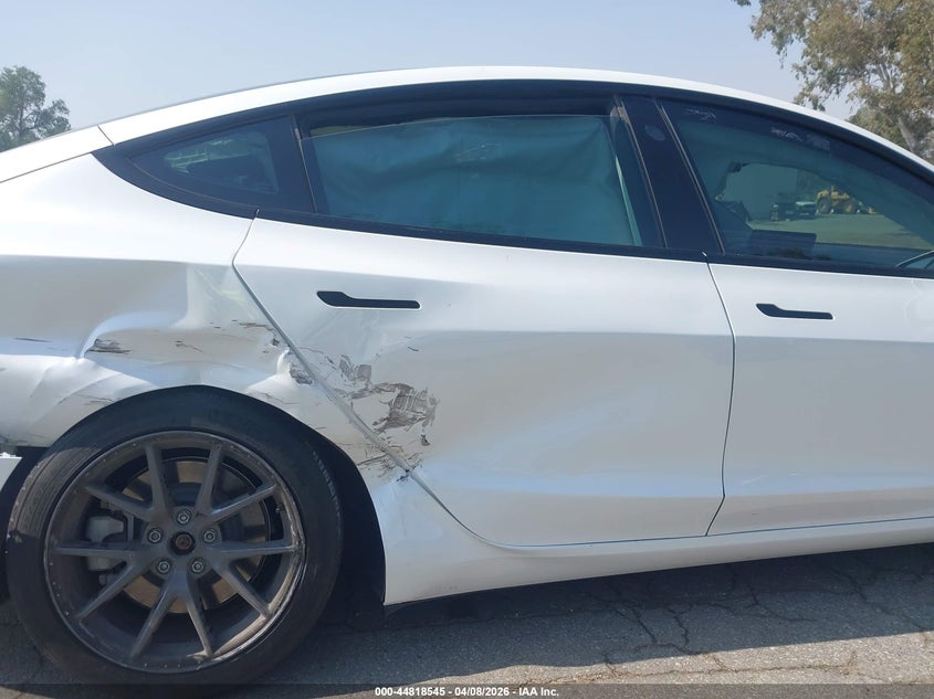 2022 Tesla Model 3 VIN 5YJ3E1EB5NF265634 IAAI salvage auction — RIGHT SIDE, Salvage Title, sold $7,100 on 2026-07-07 (photo 6)