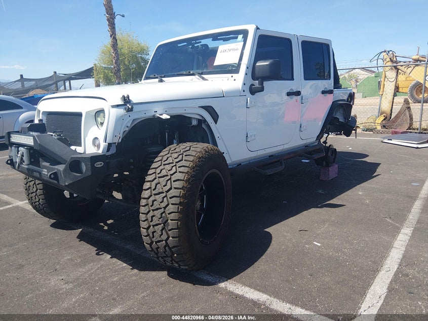 2016 Jeep Wrangler / VIN 1C4HJWDG2GL162344 IAAI salvage auction — LEFT REAR, Salvage (Nevada), sold $5,900 on 2026-07-24 (photo 2)