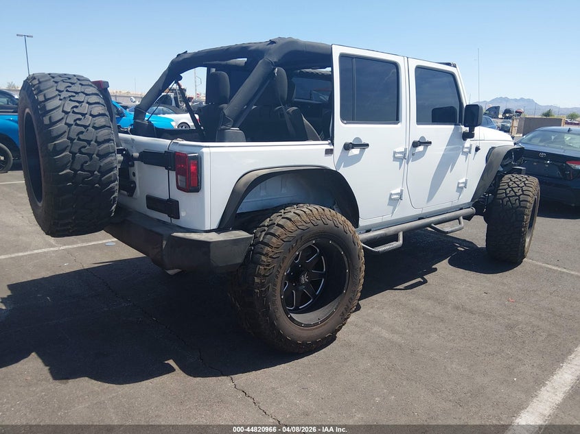 2016 Jeep Wrangler / VIN 1C4HJWDG2GL162344 IAAI salvage auction — LEFT REAR, Salvage (Nevada), sold $5,900 on 2026-07-24 (photo 4)