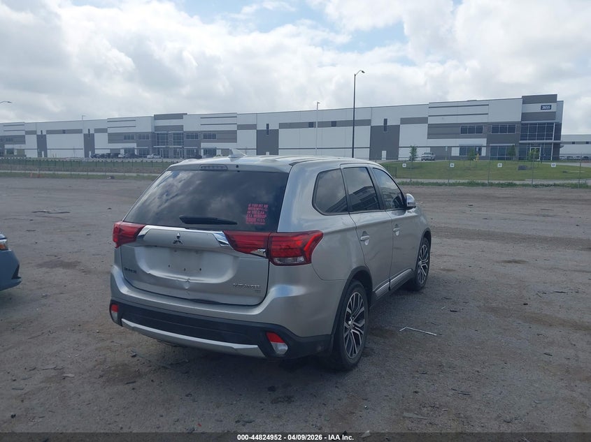 2018 Mitsubishi Outlander VIN JA4AD3A32JZ064079 IAAI salvage auction — BIO HAZARD, Salvage (Texas), sold $1,375 on 2026-07-14 (photo 4)