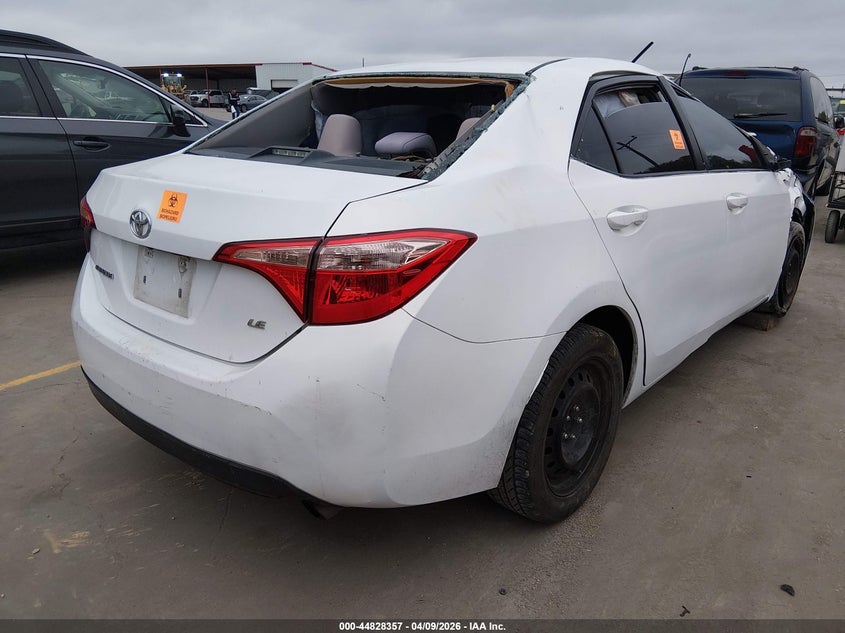 2017 Toyota Corolla VIN 5YFBURHE1HP613361 IAAI salvage auction — ROLLOVER, Salvage Title, sold $975 on 2026-07-28 (photo 4)