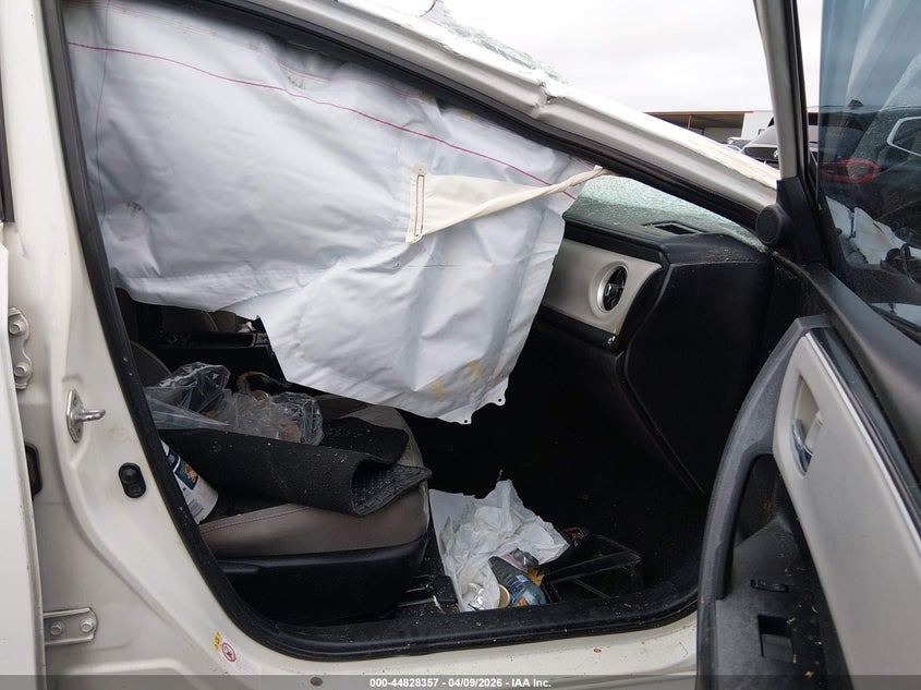 2017 Toyota Corolla VIN 5YFBURHE1HP613361 IAAI salvage auction — ROLLOVER, Salvage Title, sold $975 on 2026-07-28 (photo 5)