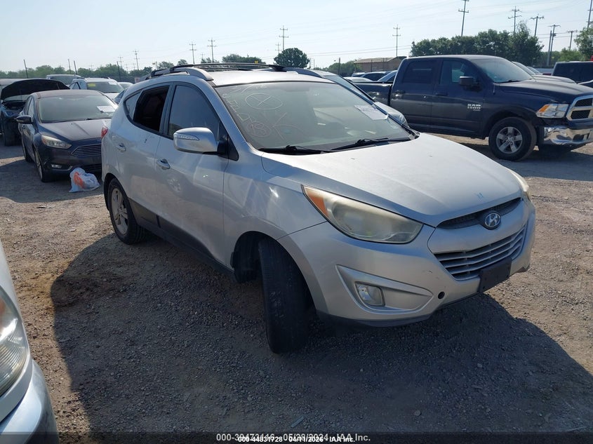 2013 Hyundai Tucson VIN KM8JU3AC0DU662061 IAAI salvage auction — LEFT FRONT, Salvage Title, sold $1,850 on 2026-08-03 (photo 1)