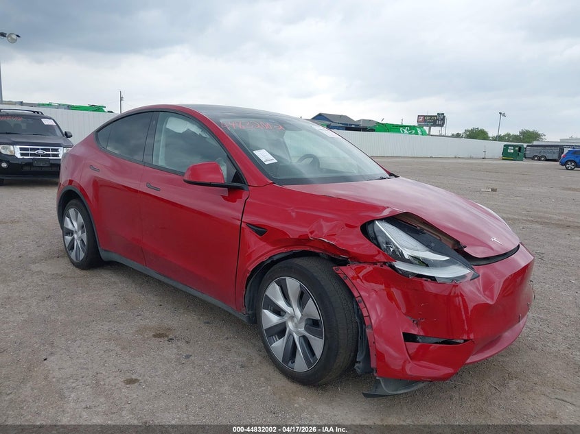 2023 Tesla Model y VIN 7SAYGDEE2PA065809 IAAI salvage auction — RIGHT FRONT, Salvage Title, sold $10,200 on 2026-07-08 (photo 1)
