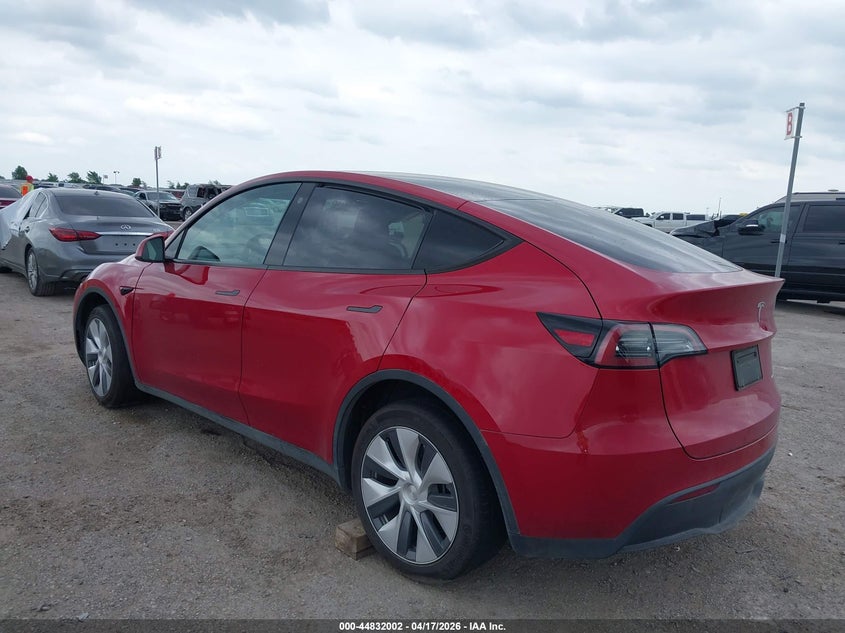 2023 Tesla Model y VIN 7SAYGDEE2PA065809 IAAI salvage auction — RIGHT FRONT, Salvage Title, sold $10,200 on 2026-07-08 (photo 3)
