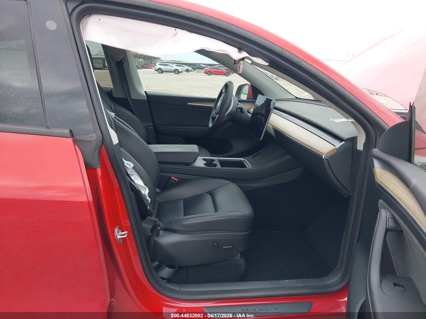 2023 Tesla Model y VIN 7SAYGDEE2PA065809 IAAI salvage auction — RIGHT FRONT, Salvage Title, sold $10,200 on 2026-07-08 (photo 5)