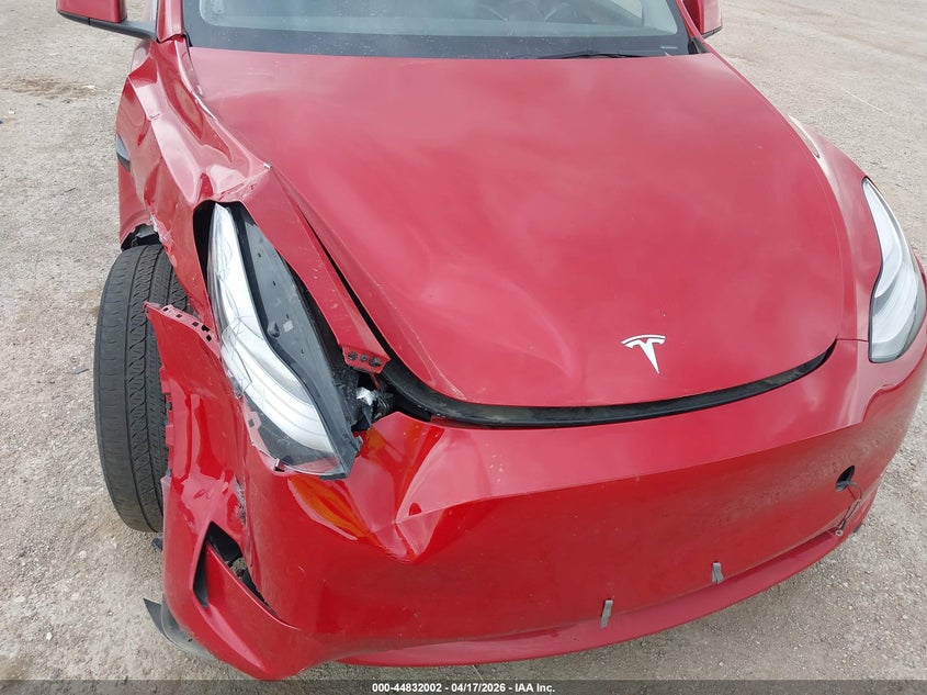 2023 Tesla Model y VIN 7SAYGDEE2PA065809 IAAI salvage auction — RIGHT FRONT, Salvage Title, sold $10,200 on 2026-07-08 (photo 6)