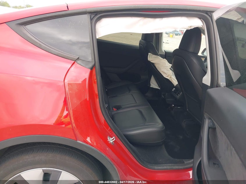 2023 Tesla Model y VIN 7SAYGDEE2PA065809 IAAI salvage auction — RIGHT FRONT, Salvage Title, sold $10,200 on 2026-07-08 (photo 8)