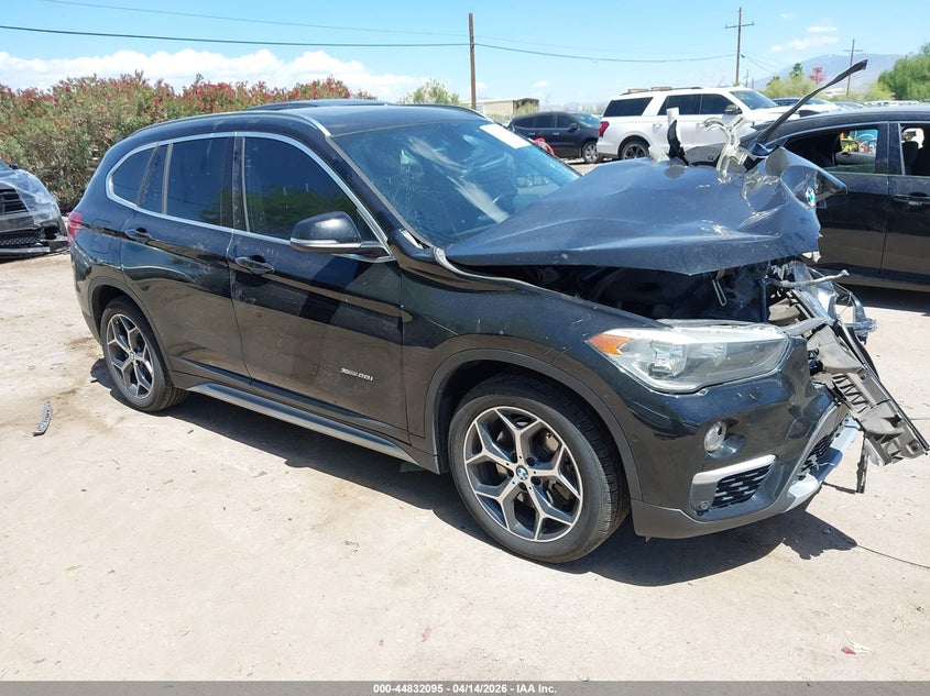 2018 BMW X1 VIN WBXHT3Z38J4A66594 IAAI salvage auction — FRONT END, Wait Title, sold $1,675 on 2026-07-09 (photo 1)