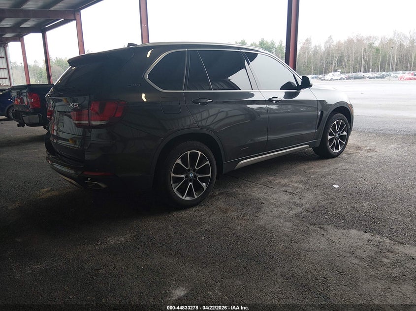 2018 BMW X5 VIN 5UXKT0C56J0W00464 IAAI salvage auction — WATER/FLOOD, Mv-907A (New York), sold $2,550 on 2026-07-30 (photo 4)