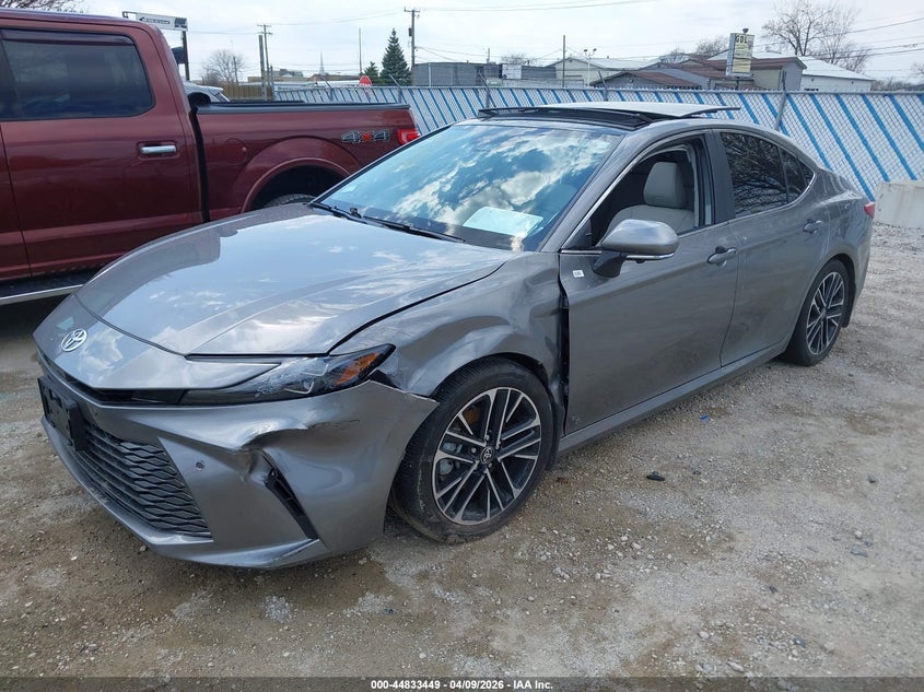 2025 Toyota Camry VIN 4T1DBADK6SU536374 IAAI salvage auction — SIDE, Salvage Title, sold $13,100 on 2026-07-31 (photo 2)