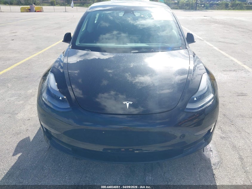 2023 Tesla Model 3 VIN 5YJ3E1EA6PF433985 IAAI salvage auction — Normal Wear, Clear (Montana), sold $19,400 on 2026-04-16 (photo 6)