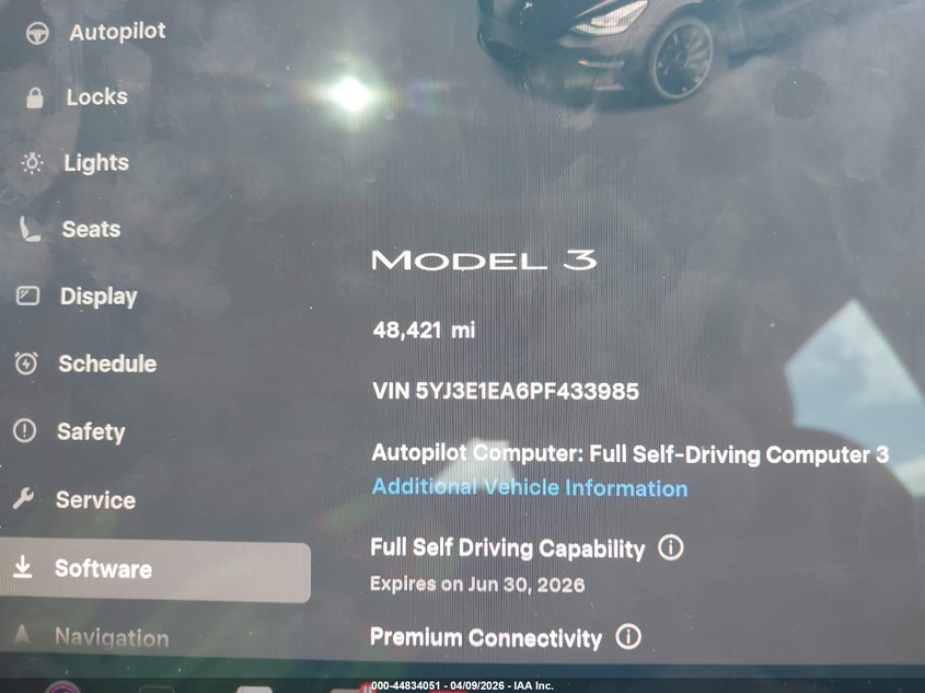 2023 Tesla Model 3 VIN 5YJ3E1EA6PF433985 IAAI salvage auction — Normal Wear, Clear (Montana), sold $19,400 on 2026-04-16 (photo 7)
