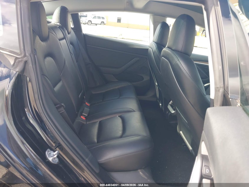 2023 Tesla Model 3 VIN 5YJ3E1EA6PF433985 IAAI salvage auction — Normal Wear, Clear (Montana), sold $19,400 on 2026-04-16 (photo 8)