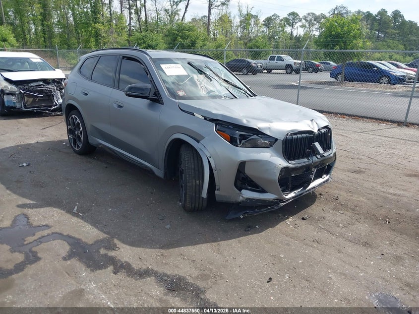 2025 BMW X1 VIN WBX13EF0XS5391831 IAAI salvage auction — FRONT & REAR, Salvage Title, sold $15,050 on 2026-07-20 (photo 1)
