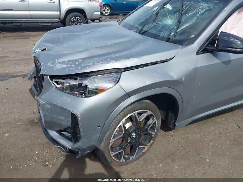 2025 BMW X1 VIN WBX13EF0XS5391831 IAAI salvage auction — FRONT & REAR, Salvage Title, sold $15,050 on 2026-07-20 (photo 6)