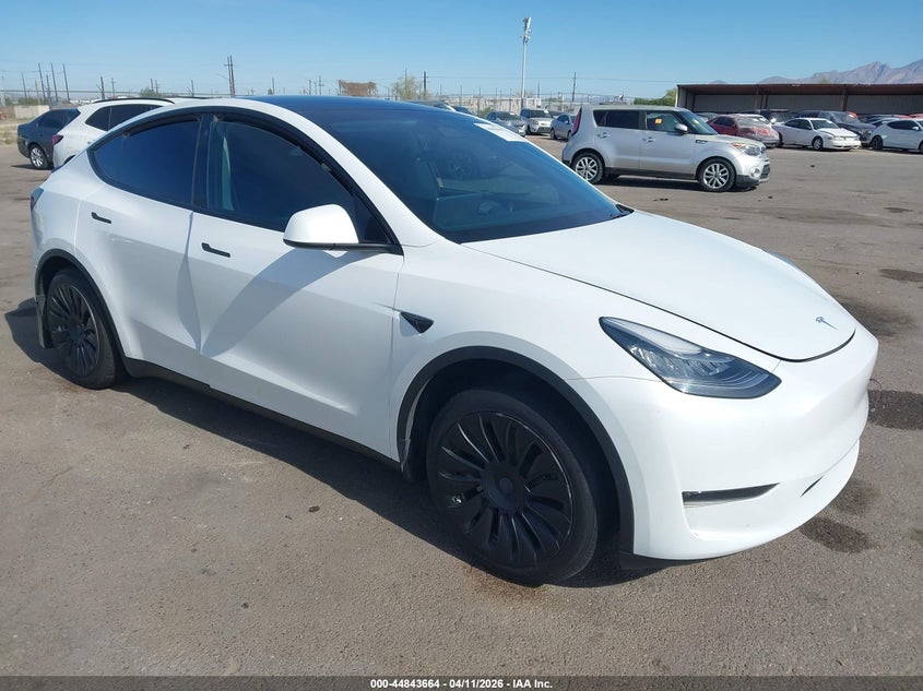 2023 Tesla Model y VIN 7SAYGDEE5PA090221 IAAI salvage auction — LEFT REAR, Salvage Title, sold $11,250 on 2026-07-09 (photo 1)