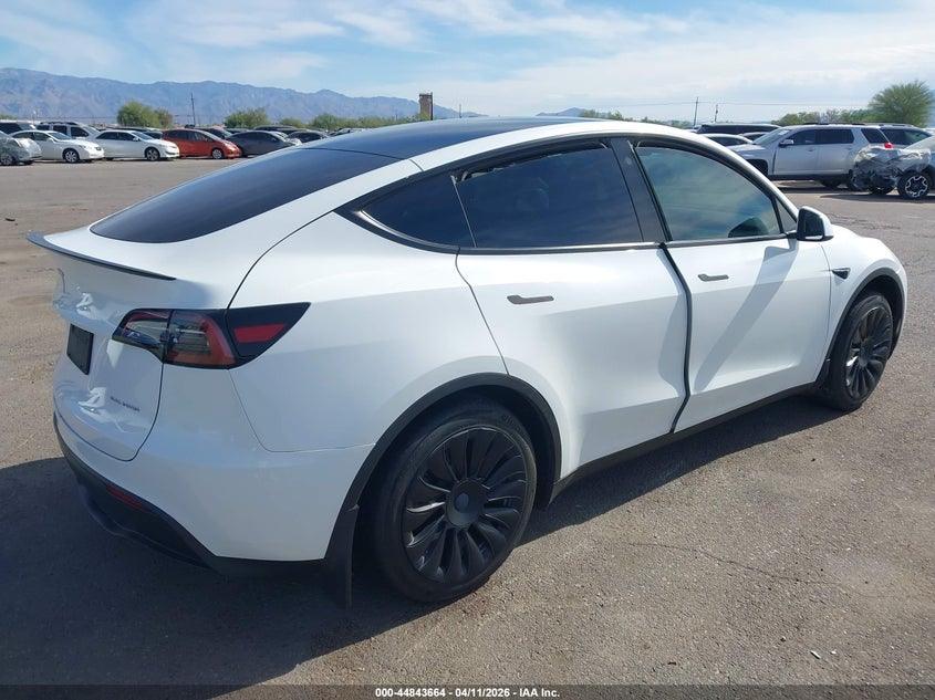 2023 Tesla Model y VIN 7SAYGDEE5PA090221 IAAI salvage auction — LEFT REAR, Salvage Title, sold $11,250 on 2026-07-09 (photo 4)