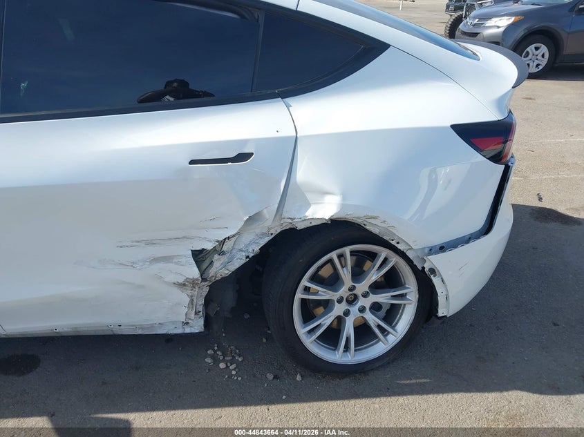 2023 Tesla Model y VIN 7SAYGDEE5PA090221 IAAI salvage auction — LEFT REAR, Salvage Title, sold $11,250 on 2026-07-09 (photo 6)