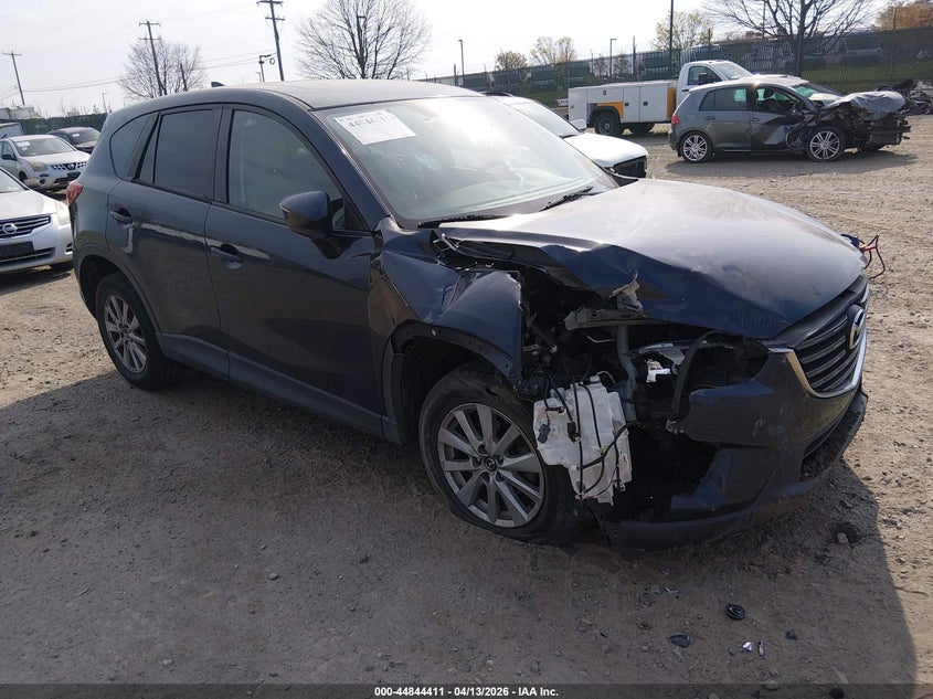 2016 Mazda Cx-5 VIN JM3KE4CYXG0877566 IAAI salvage auction — RIGHT FRONT, Salvage Title, sold $2,800 on 2026-07-10 (photo 1)