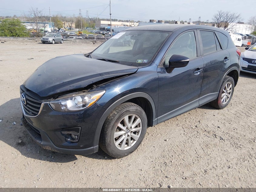 2016 Mazda Cx-5 VIN JM3KE4CYXG0877566 IAAI salvage auction — RIGHT FRONT, Salvage Title, sold $2,800 on 2026-07-10 (photo 2)