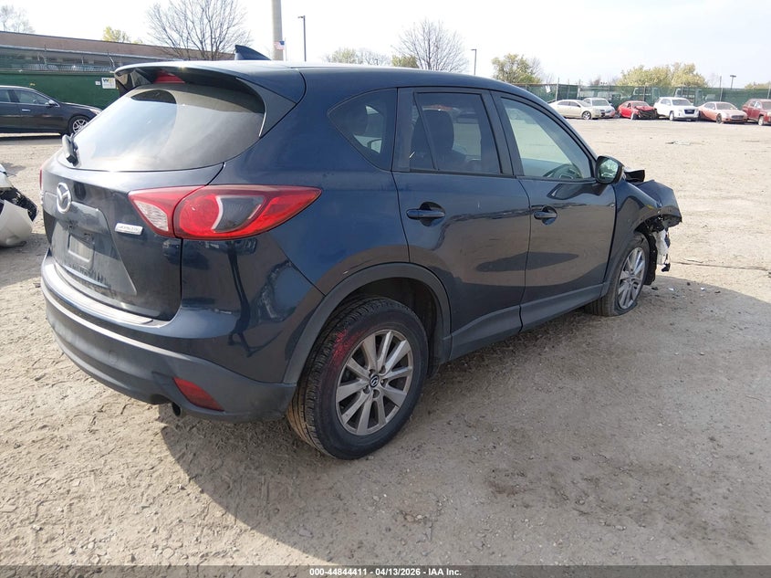 2016 Mazda Cx-5 VIN JM3KE4CYXG0877566 IAAI salvage auction — RIGHT FRONT, Salvage Title, sold $2,800 on 2026-07-10 (photo 4)