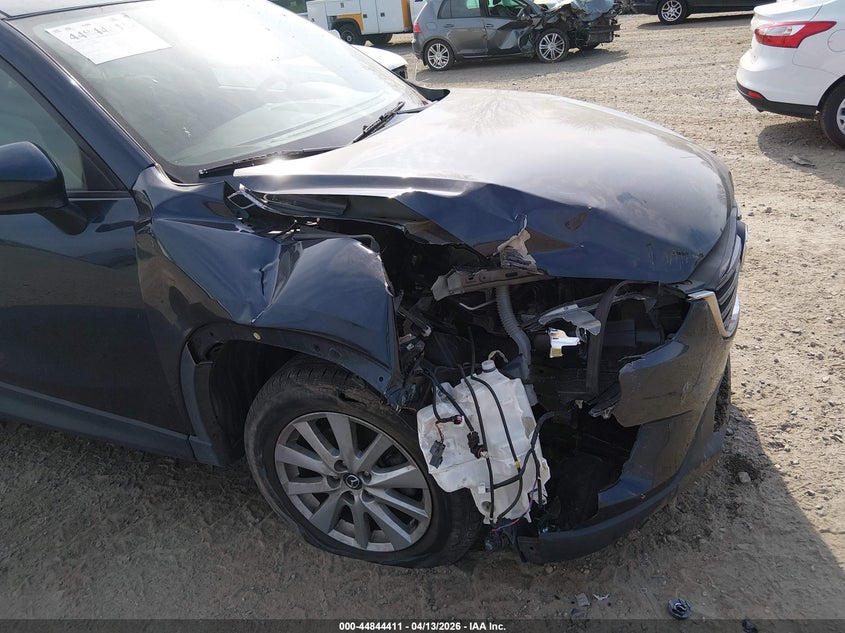 2016 Mazda Cx-5 VIN JM3KE4CYXG0877566 IAAI salvage auction — RIGHT FRONT, Salvage Title, sold $2,800 on 2026-07-10 (photo 6)