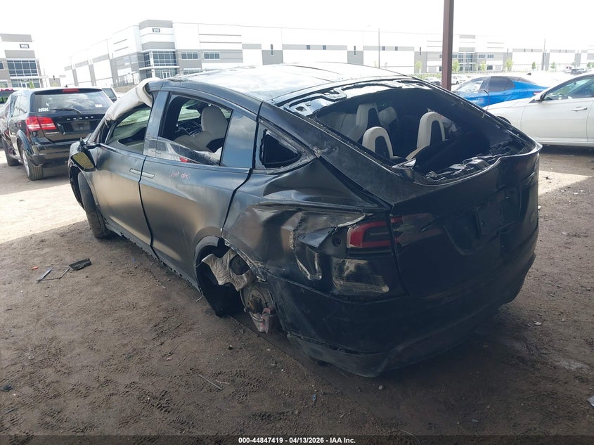 2023 Tesla Model x VIN 7SAXCBE61PF404194 IAAI salvage auction — ROLLOVER, Salvage Title, sold $11,700 on 2026-07-09 (photo 3)