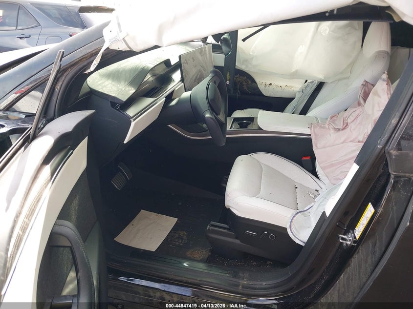 2023 Tesla Model x VIN 7SAXCBE61PF404194 IAAI salvage auction — ROLLOVER, Salvage Title, sold $11,700 on 2026-07-09 (photo 5)