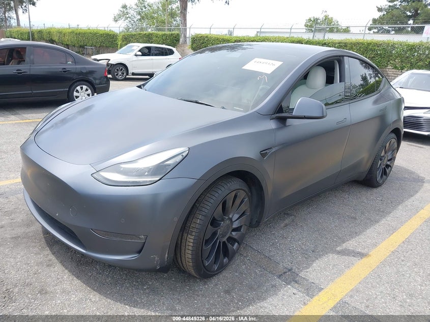 2022 Tesla Model y VIN 7SAYGDEF4NF397081 IAAI salvage auction — RIGHT REAR, Salvage Title, sold $9,300 on 2026-07-14 (photo 2)