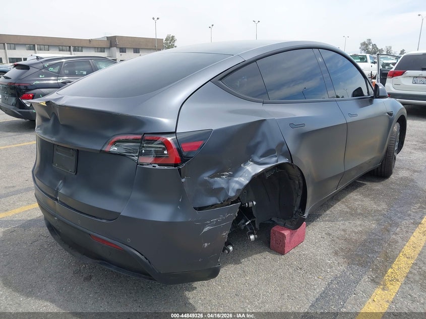 2022 Tesla Model y VIN 7SAYGDEF4NF397081 IAAI salvage auction — RIGHT REAR, Salvage Title, sold $9,300 on 2026-07-14 (photo 4)