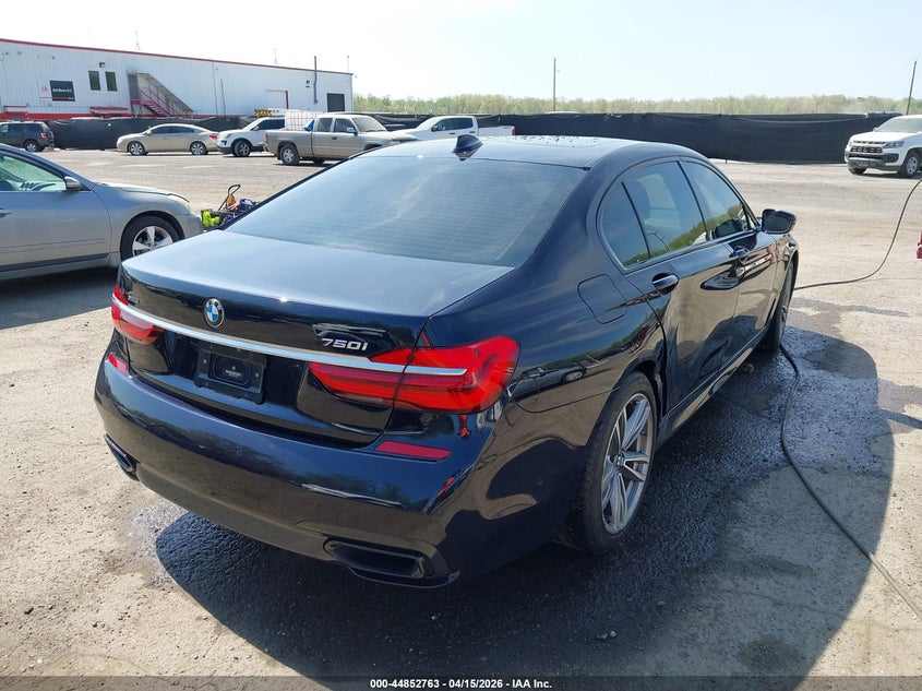 2016 BMW 7er VIN WBA7F2C55GG416902 IAAI salvage auction — RIGHT SIDE, Wait Title, sold $10,000 on 2026-07-29 (photo 4)