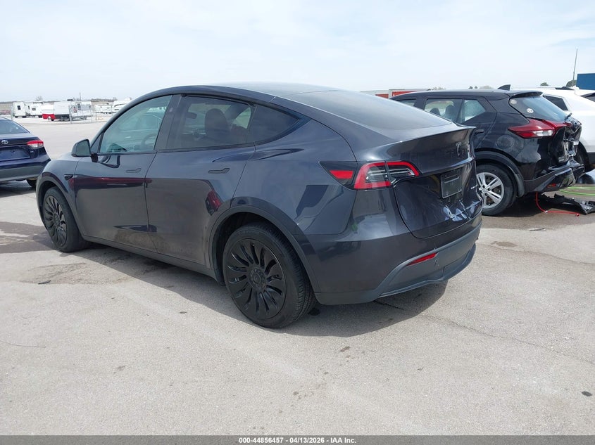 2024 Tesla Model y VIN 7SAYGDEE6RA255826 IAAI salvage auction — FRONT & REAR, Salvage (Nebraska), sold $10,500 on 2026-08-01 (photo 3)