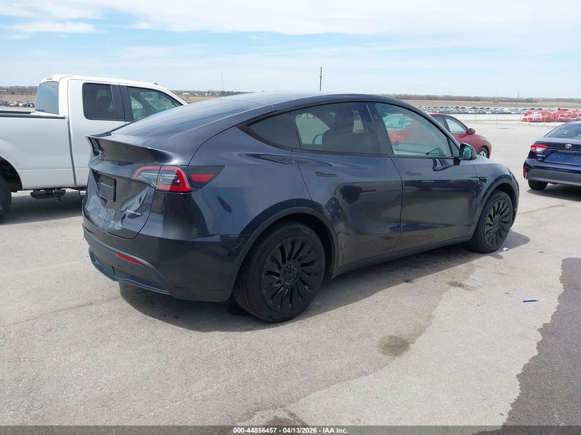 2024 Tesla Model y VIN 7SAYGDEE6RA255826 IAAI salvage auction — FRONT & REAR, Salvage (Nebraska), sold $10,500 on 2026-08-01 (photo 4)