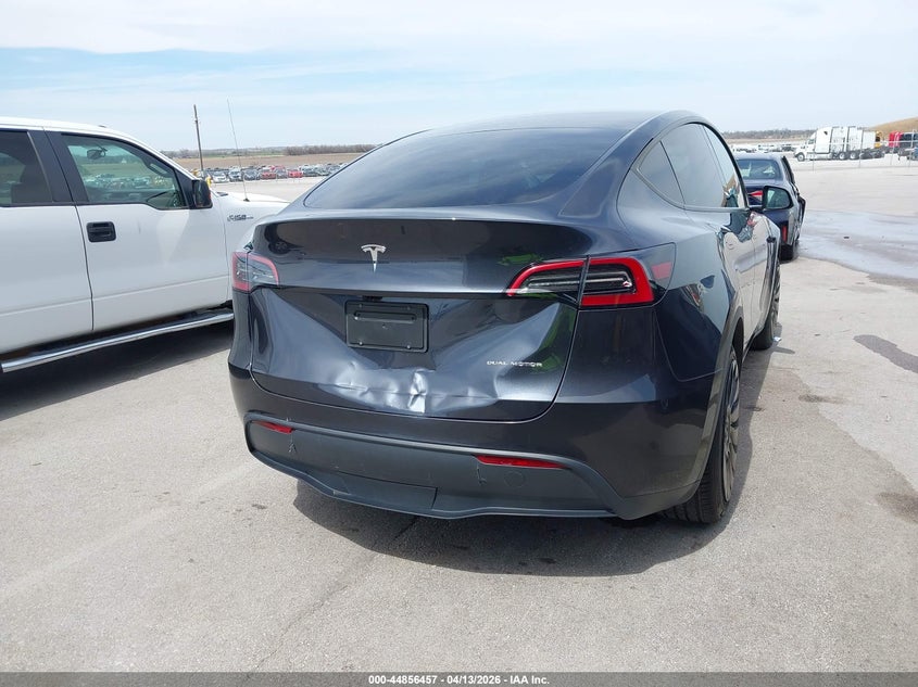 2024 Tesla Model y VIN 7SAYGDEE6RA255826 IAAI salvage auction — FRONT & REAR, Salvage (Nebraska), sold $10,500 on 2026-08-01 (photo 6)