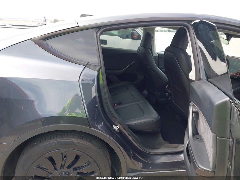 2024 Tesla Model y VIN 7SAYGDEE6RA255826 IAAI salvage auction — FRONT & REAR, Salvage (Nebraska), sold $10,500 on 2026-08-01 (photo 8)