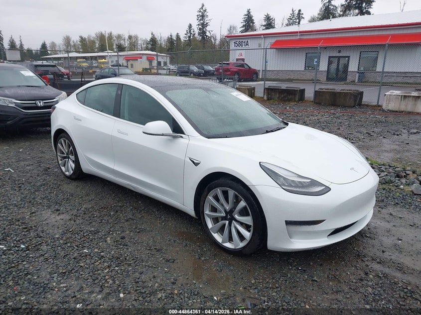 2019 Tesla Model 3 VIN 5YJ3E1EB7KF390453 IAAI salvage auction — SIDE, Wait Title, sold $11,500 on 2026-07-15 (photo 1)
