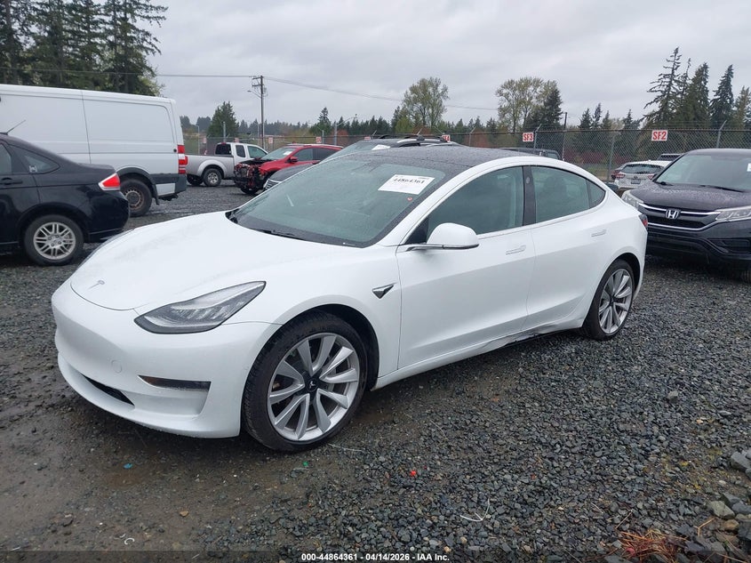 2019 Tesla Model 3 VIN 5YJ3E1EB7KF390453 IAAI salvage auction — SIDE, Wait Title, sold $11,500 on 2026-07-15 (photo 2)