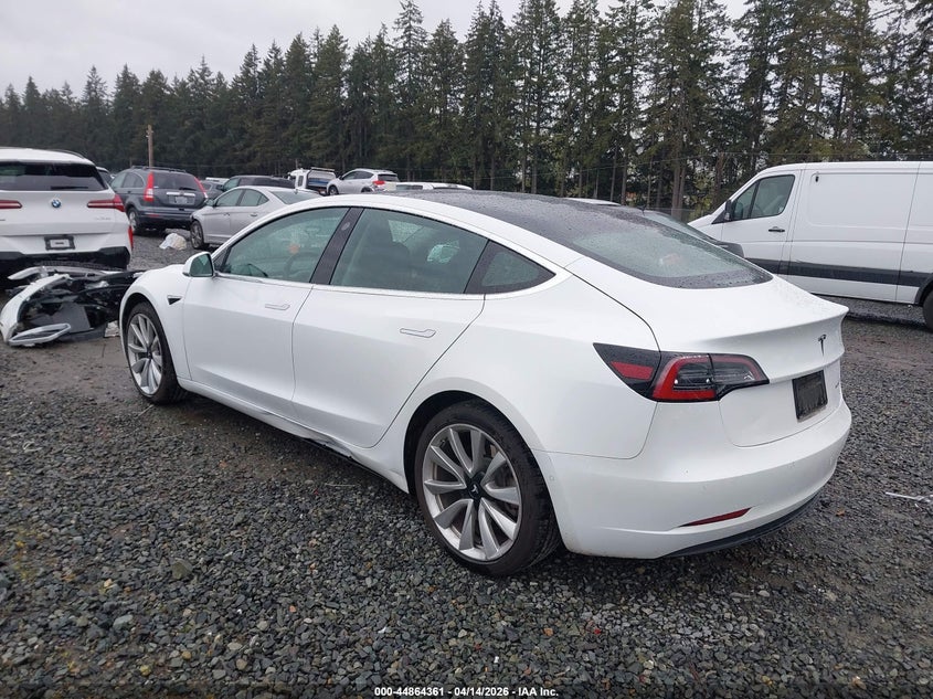 2019 Tesla Model 3 VIN 5YJ3E1EB7KF390453 IAAI salvage auction — SIDE, Wait Title, sold $11,500 on 2026-07-15 (photo 3)