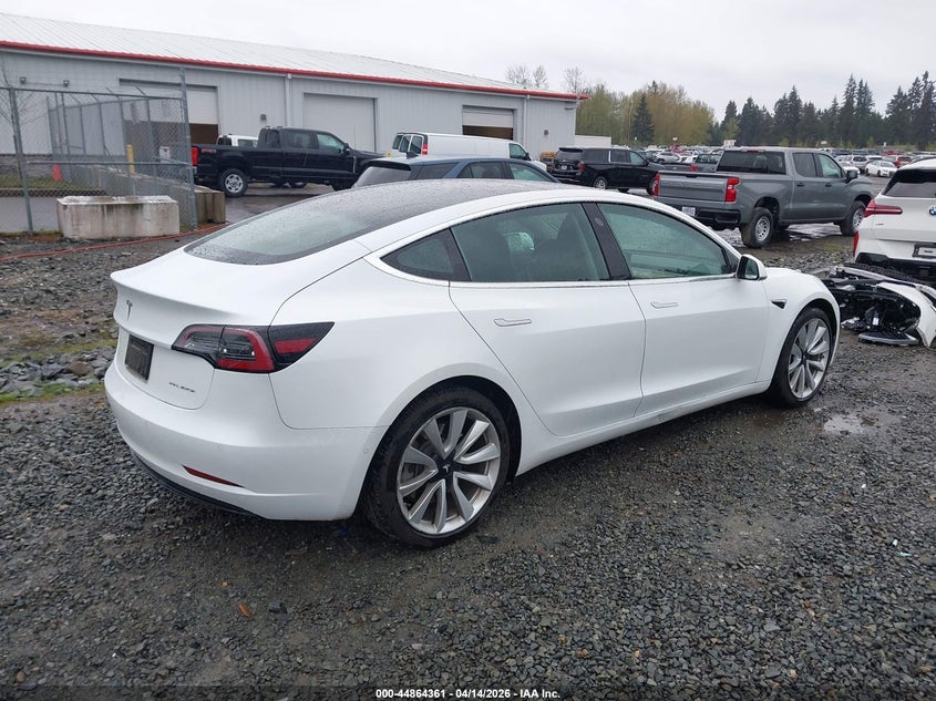 2019 Tesla Model 3 VIN 5YJ3E1EB7KF390453 IAAI salvage auction — SIDE, Wait Title, sold $11,500 on 2026-07-15 (photo 4)