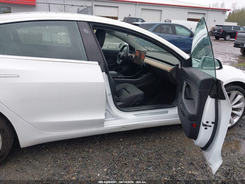 2019 Tesla Model 3 VIN 5YJ3E1EB7KF390453 IAAI salvage auction — SIDE, Wait Title, sold $11,500 on 2026-07-15 (photo 5)