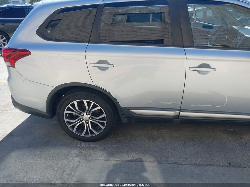 2016 Mitsubishi Outlander VIN JA4AD2A3XGZ033570 IAAI salvage auction — SIDE, Wait Title, sold $2,150 on 2026-07-20 (photo 6)