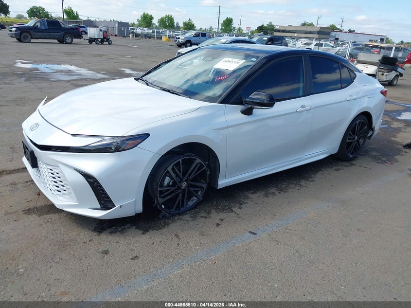 2026 Toyota Camry VIN 4T1DAACK5TU215156 IAAI salvage auction — SIDE, Salvage (California), sold $16,200 on 2026-08-01 (photo 2)