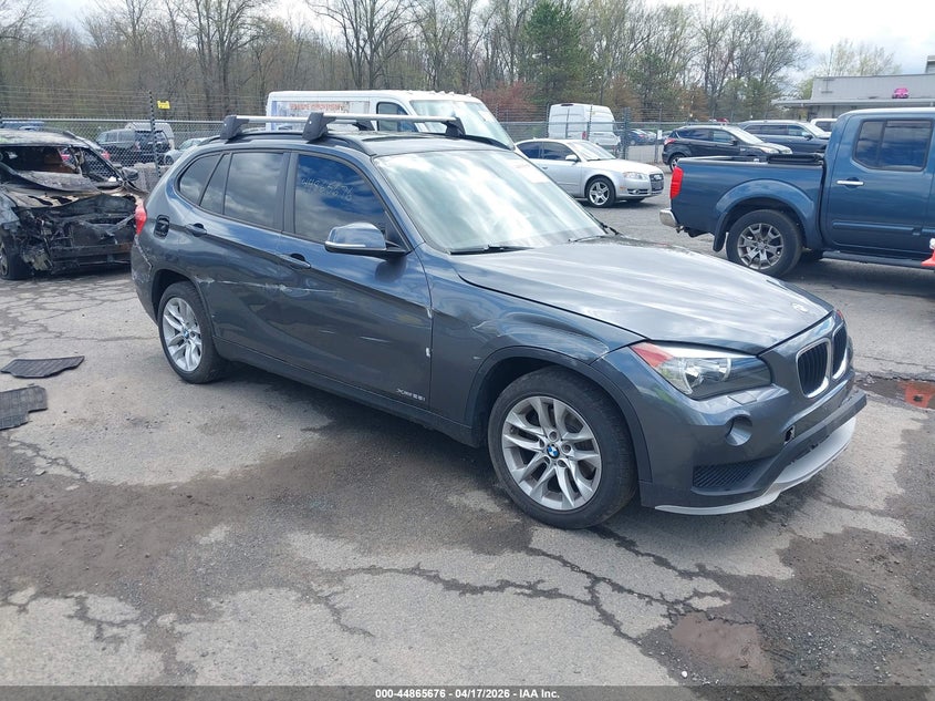2015 BMW X1 VIN WBAVL1C55FVY41430 IAAI salvage auction — LEFT & RIGHT, Salvage Title, sold $25 on 2026-07-30 (photo 1)