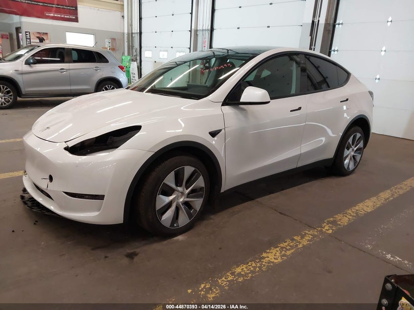 2023 Tesla Model y VIN 7SAYGDEE5PF788671 IAAI salvage auction — RIGHT FRONT, Salvage (Oregon), sold $10,800 on 2026-07-09 (photo 2)